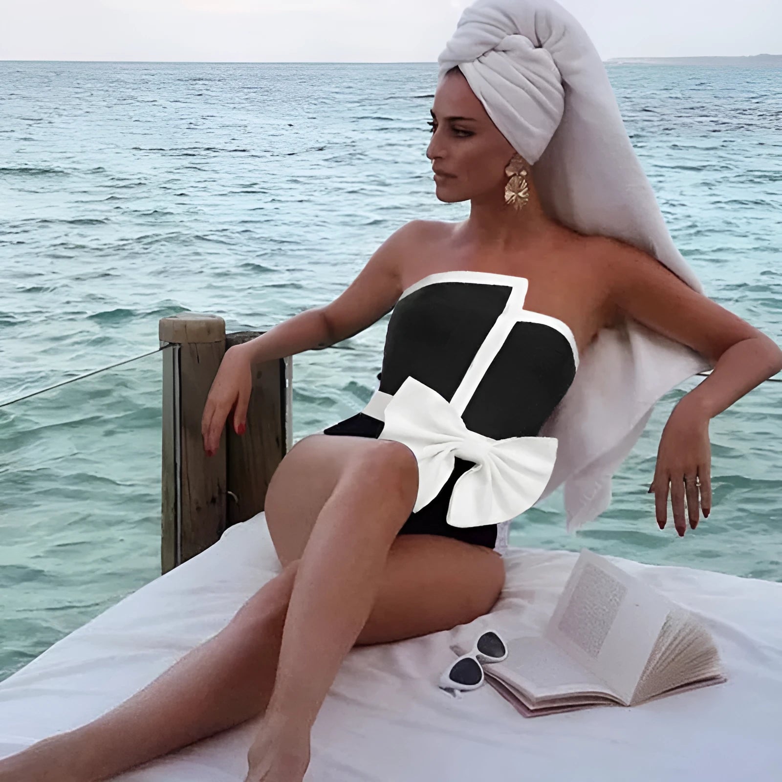 Black and white colour-block women's swimsuit with bow detail and irregular tube top