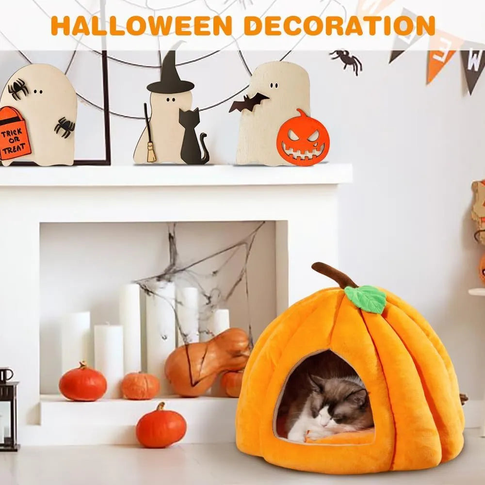 Grey pumpkin-shaped semi-enclosed cat cave bed with a round entry hole on a wooden floor.