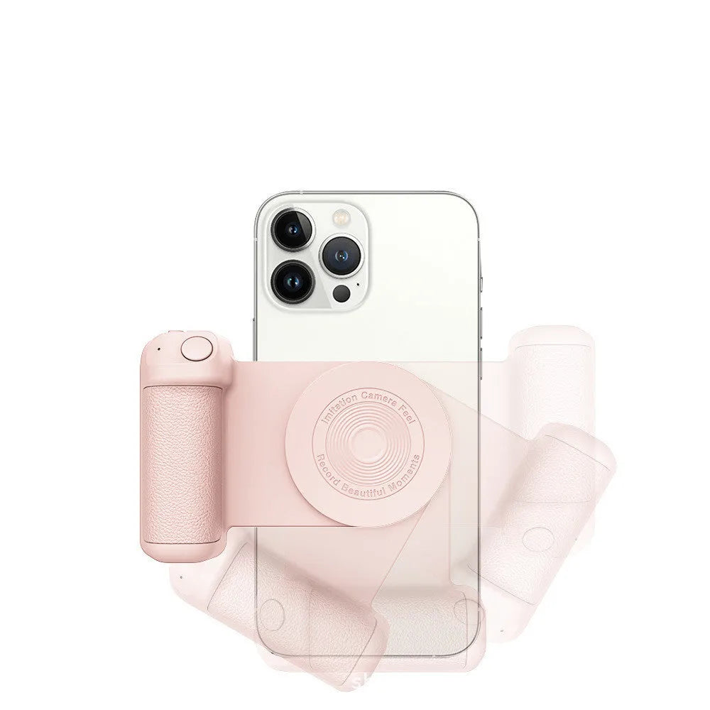 Black magnetic phone camera grip holder with rotatable bracket on a table.