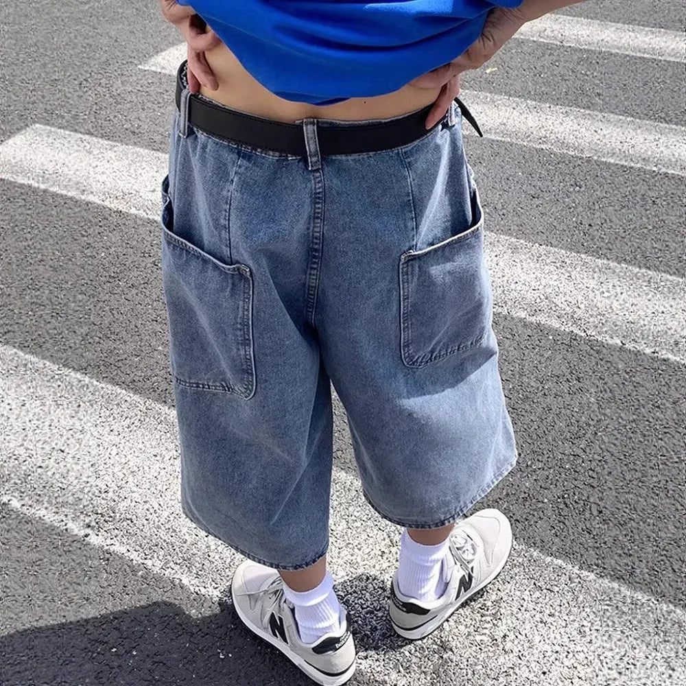 Men's blue thin denim pirate shorts with a high waist and cropped length on a hanger.