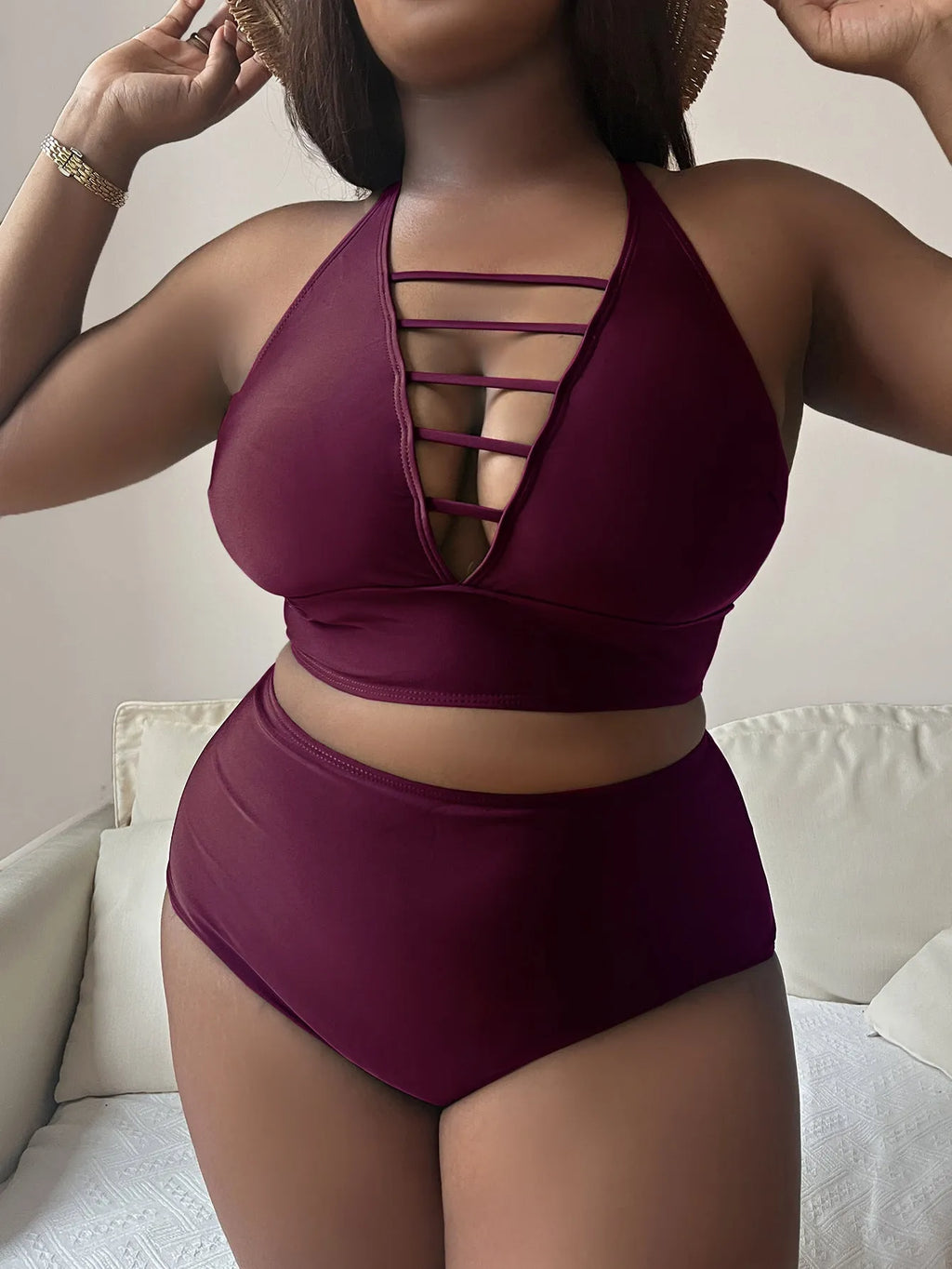 Plus size halter bikini with adjustable straps and high-waisted briefs in solid colour