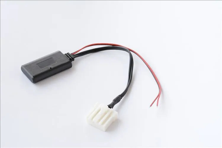 Black Bluetooth audio adapter cable for Mazda cars with aux and MEDIA button.