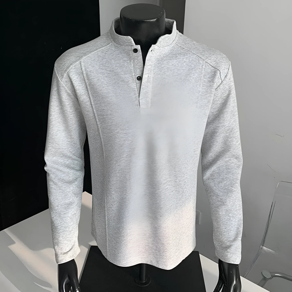 Men's grey asymmetric stand-up collar long sleeve polo shirt on a hanger.