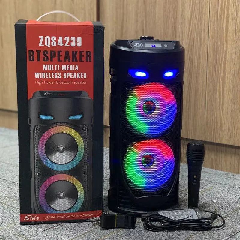 Black portable Bluetooth speaker with dual horn design and wheat aesthetic details