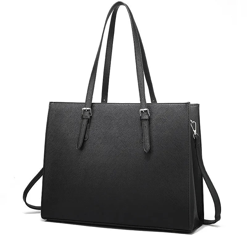 Large black women's business shoulder bag showing computer compartment and three adjustable straps