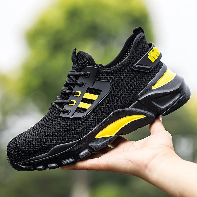Men's Flyknit steel toe cap low-top work shoes in black, grey, and yellow colour options