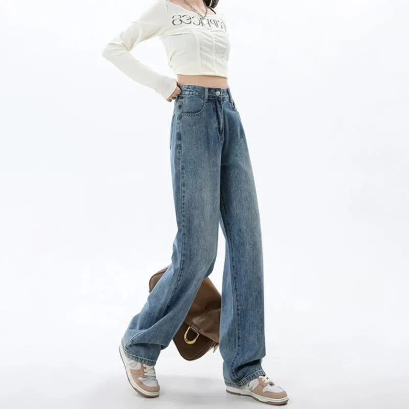 Retro blue high waist wide leg women's jeans on a hanger, showing straight leg cut.
