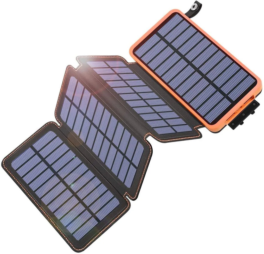 A black outdoor solar power bank with a solar panel, LED light, and soft leather finish, shown with a charging cable.