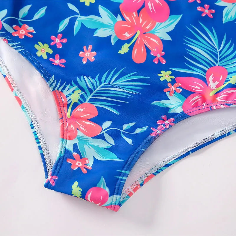 Girl's long-sleeve one-piece swimming suit in polyester briefs style