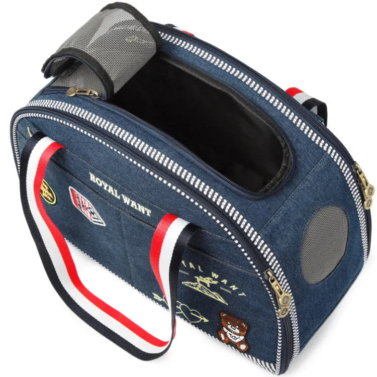 Blue denim pet diaper bag with cartoon print, dimensions 43x20x30cm.