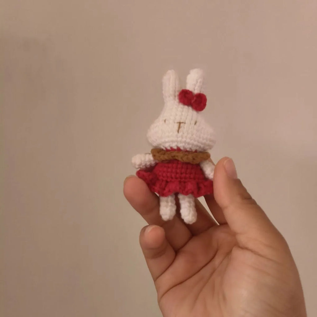 Hand-crocheted wool rabbit pendant accessory with key chain attachment option