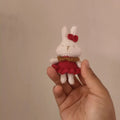 Hand-crocheted wool rabbit pendant accessory with key chain attachment option