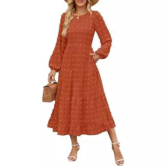 Beige long sleeve casual dress with ruffled sleeves and a high waist on a hanger.