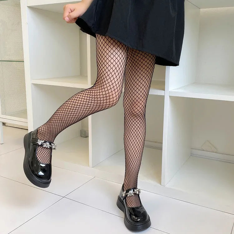 Women's mesh stockings showing large, medium and small hole patterns in black and white colours