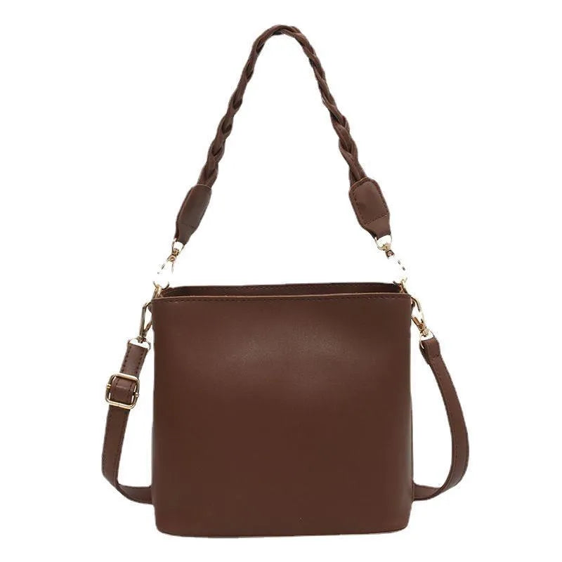 Khaki unisex PU crossbody bucket bag with woven texture and shoulder strap