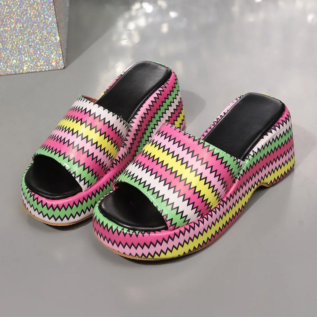 Women's colourful wave print wedge sandals with a thick rubber sole and fish mouth toe.