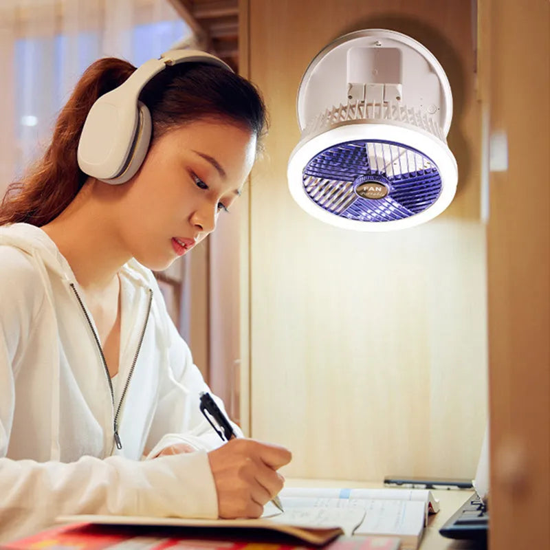 Blue foldable USB desk fan with LED light, shown in open position with 300° head tilt