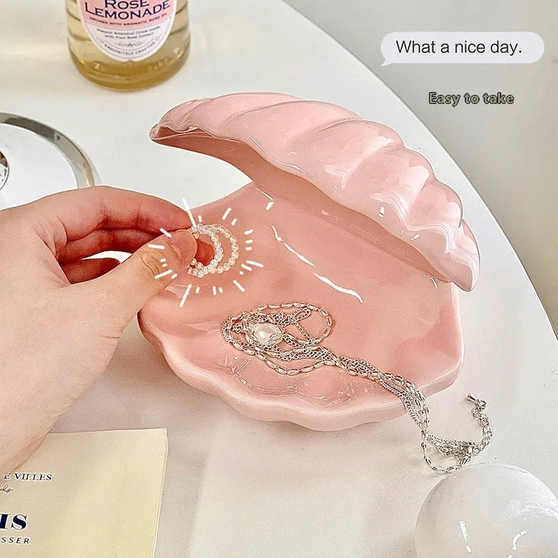 Yellow porcelain tray with a choice of pink or white decorative shell, some versions include a small integrated night light.