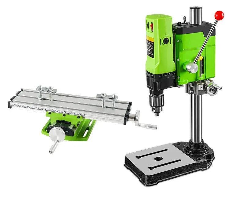 Bench-mounted drilling and milling machine with cross bench pliers and heavy-duty bench pliers.