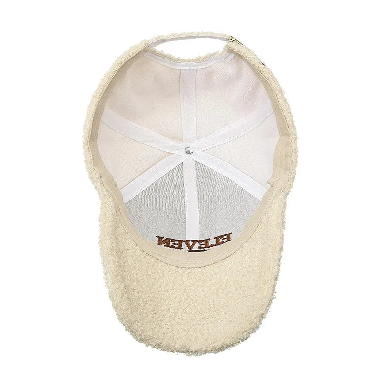 Adjustable winter baseball cap in thickened polyester lambskin fabric shown in multiple colour options