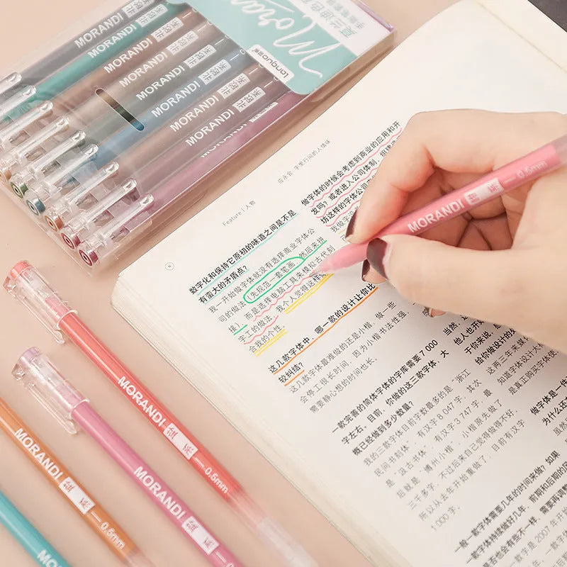 Set of nine retro colour gel pens with 0.5mm tips in a plastic storage case