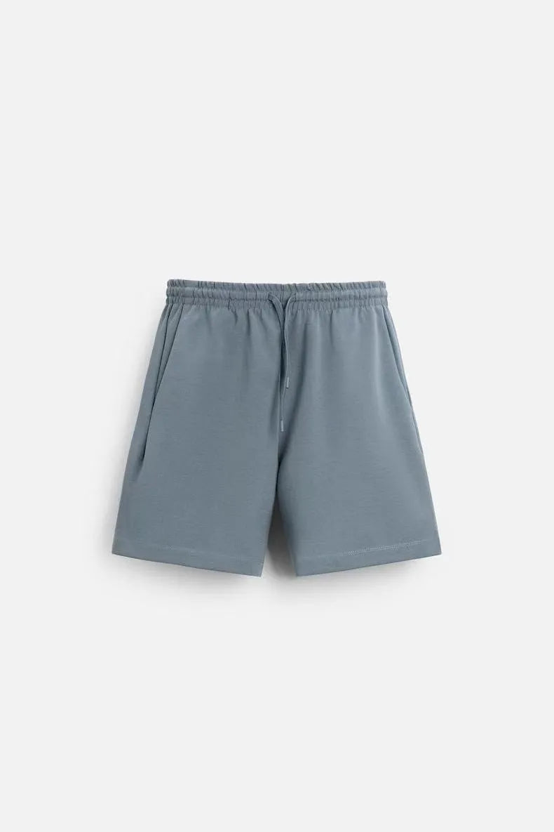 Men's loose fit round collar short sleeve top and matching shorts casual set in blue.