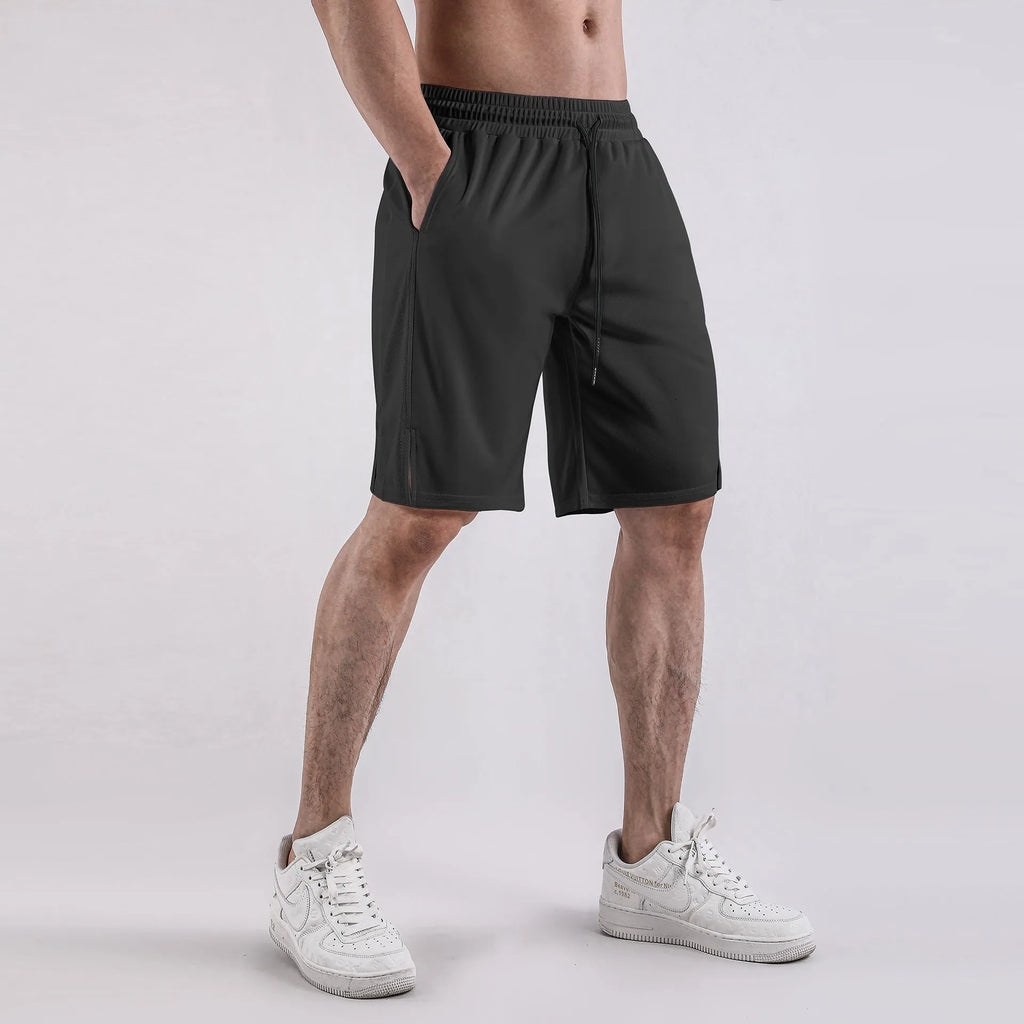 Men's black quick-drying mesh sports shorts with a loose fit and elasticated waist.