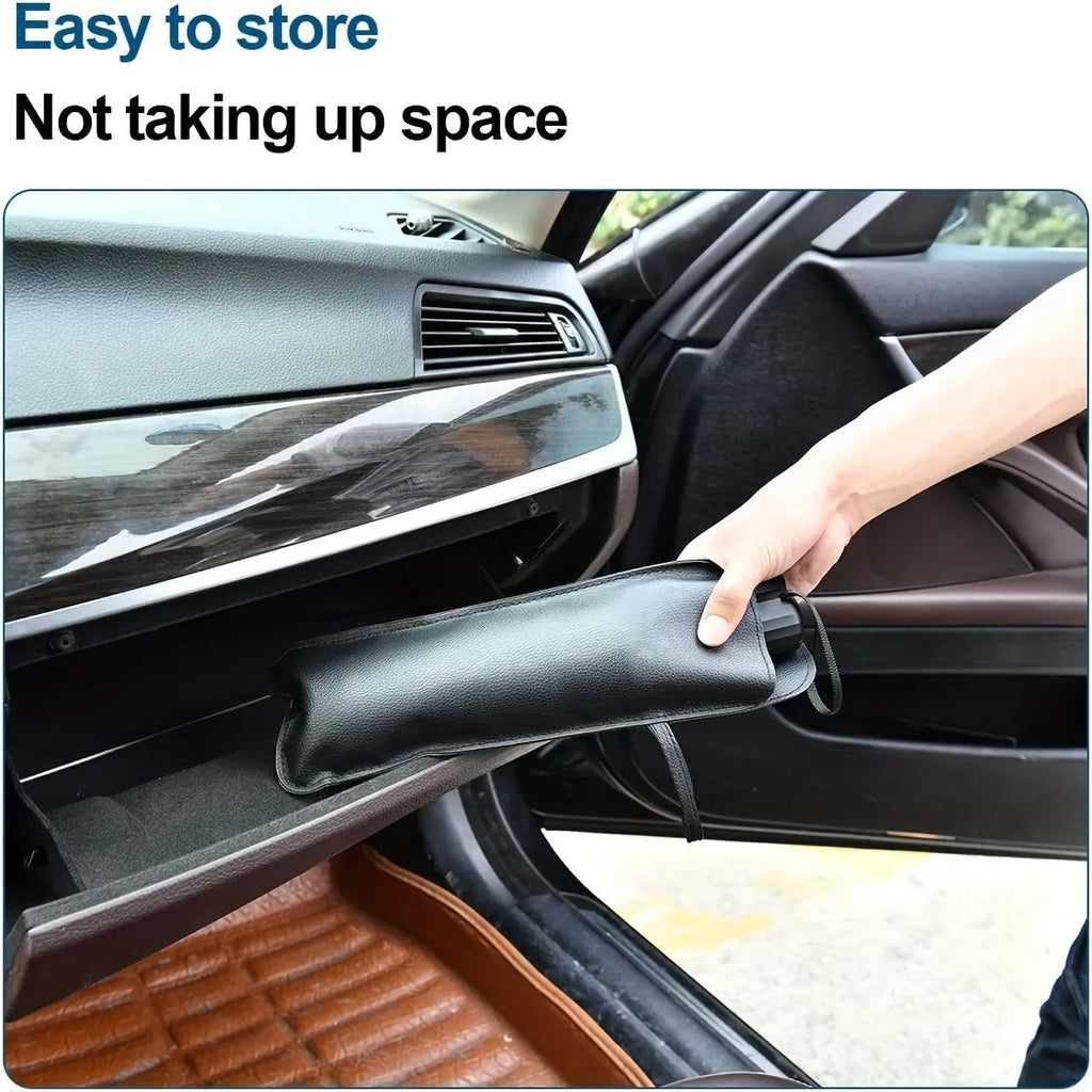 Foldable car windshield sunshade umbrella shown in open position against vehicle windshield