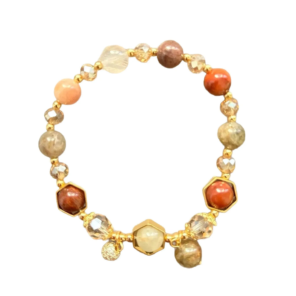 Gold citrine crystal bracelet with hand-woven construction showing auspicious Chinese symbols