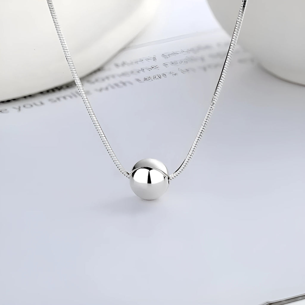 Sterling silver clavicle chain necklace with small ball pendant on delicate chain