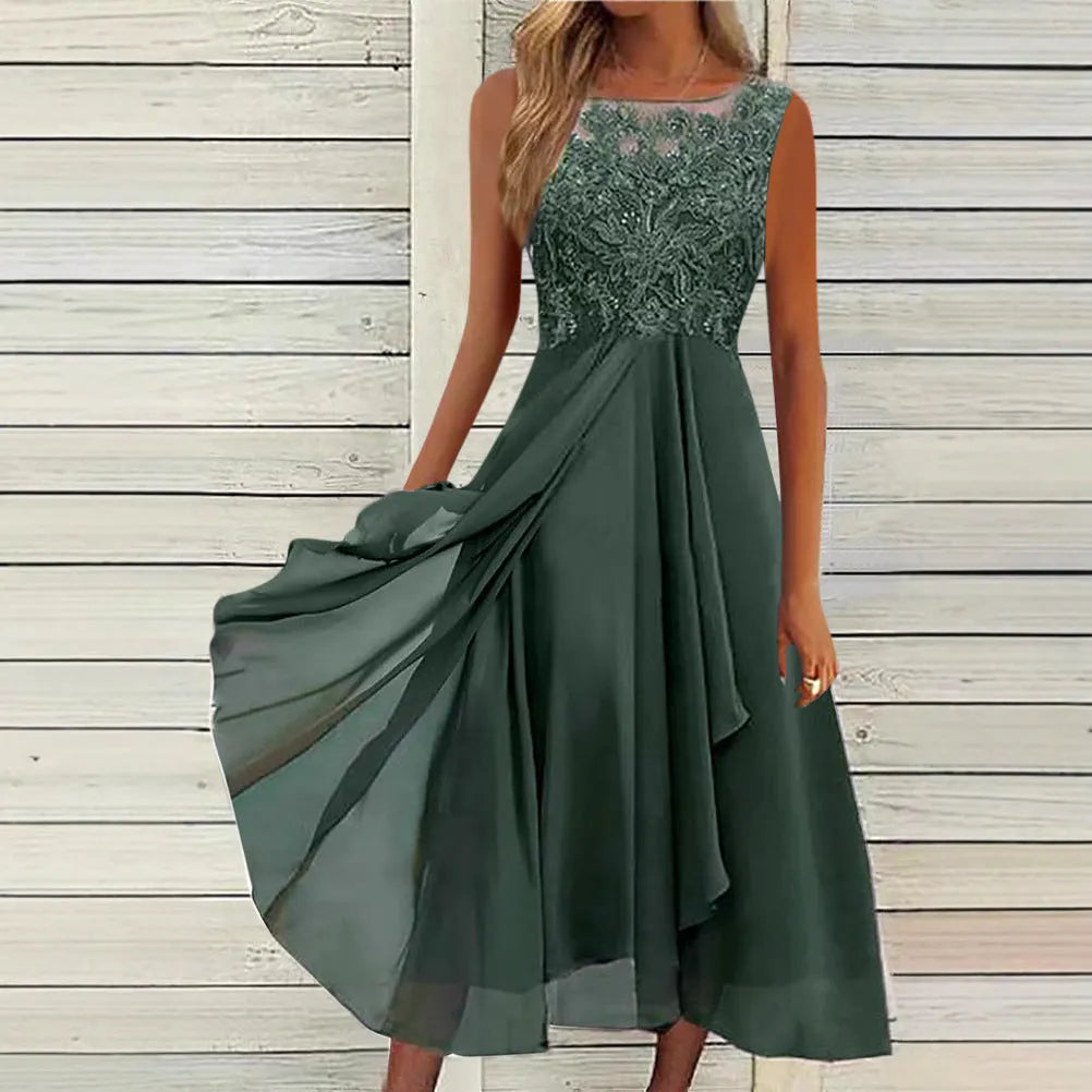 Women's sleeveless green chiffon dress with lace hollow-out detailing on a mannequin.