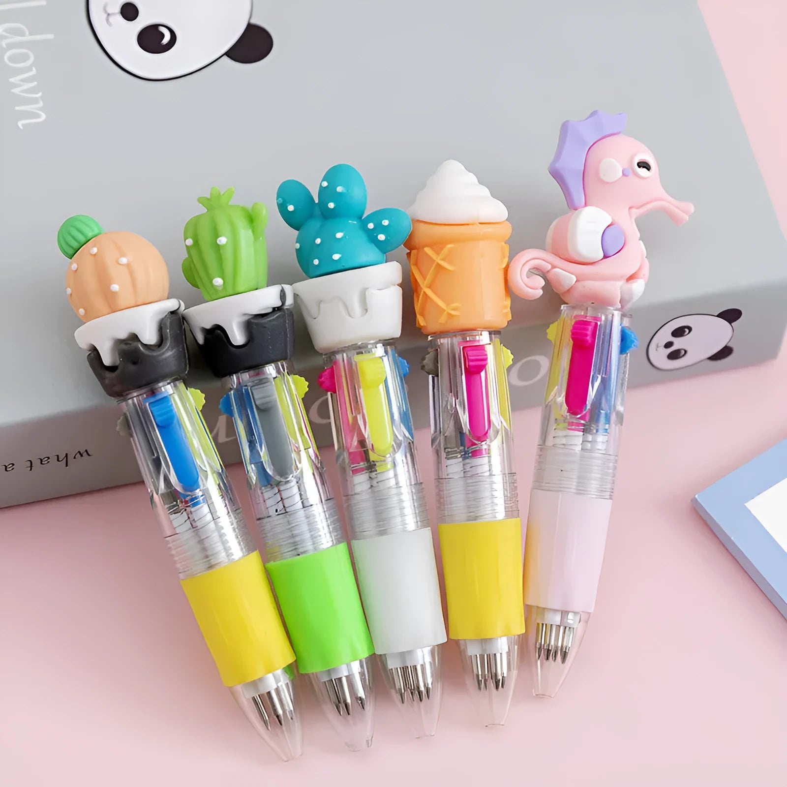 Cartoon four-colour press ballpoint pen with 0.7mm bullet tip in random design selection