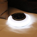 Blue Bluetooth desk lamp speaker with folding design and touch controls showing LED lighting