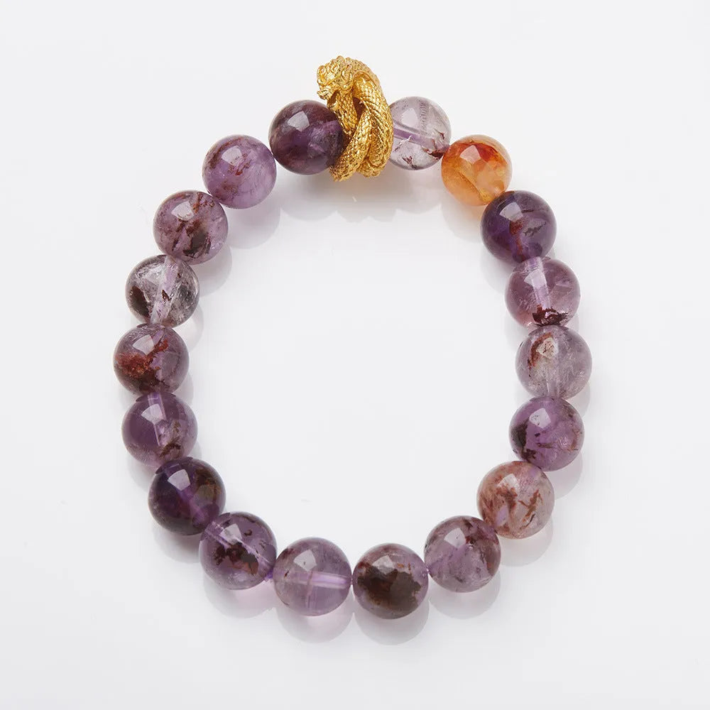 Purple crystal bracelet with animal zodiac beads and nine purple good luck elements
