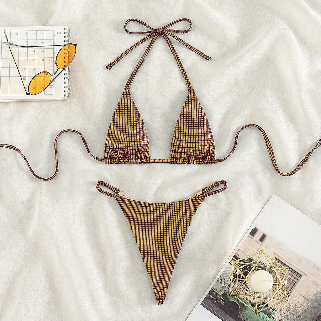 Women's solid colour T-back split bikini swimwear set in blue on a mannequin.
