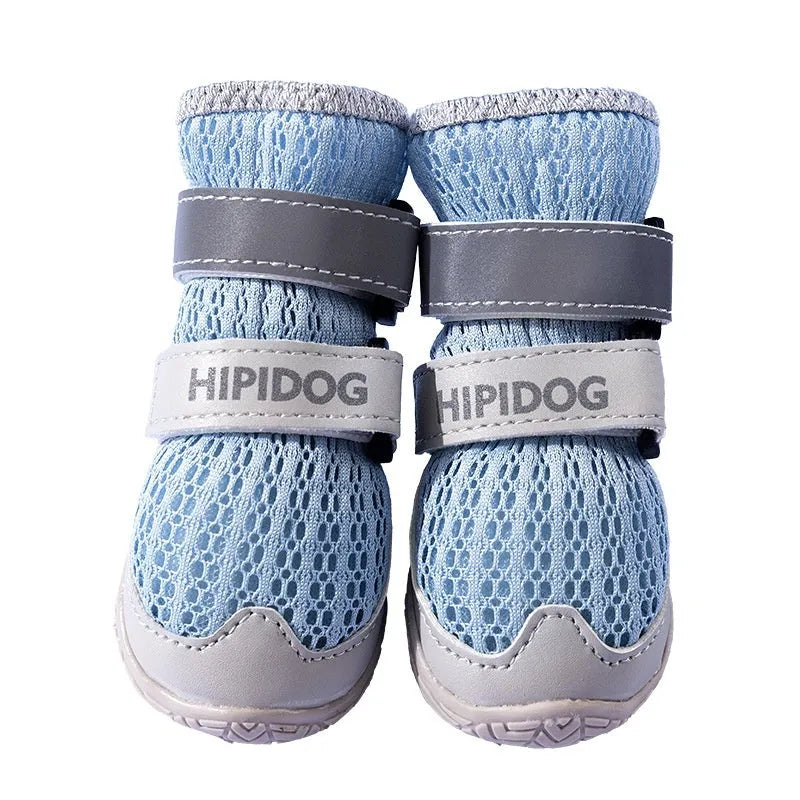 Cartoon style blue and green dog shoes made from PU material for summer paw protection.