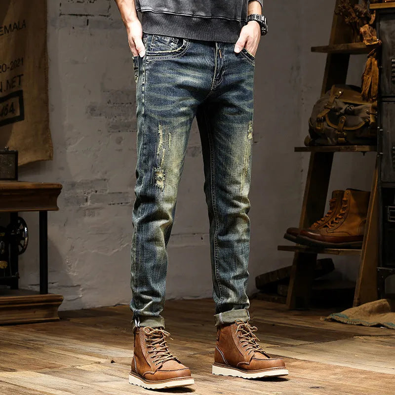 Men's skinny fit jeans in a retro blue wash with a zip fly closure.