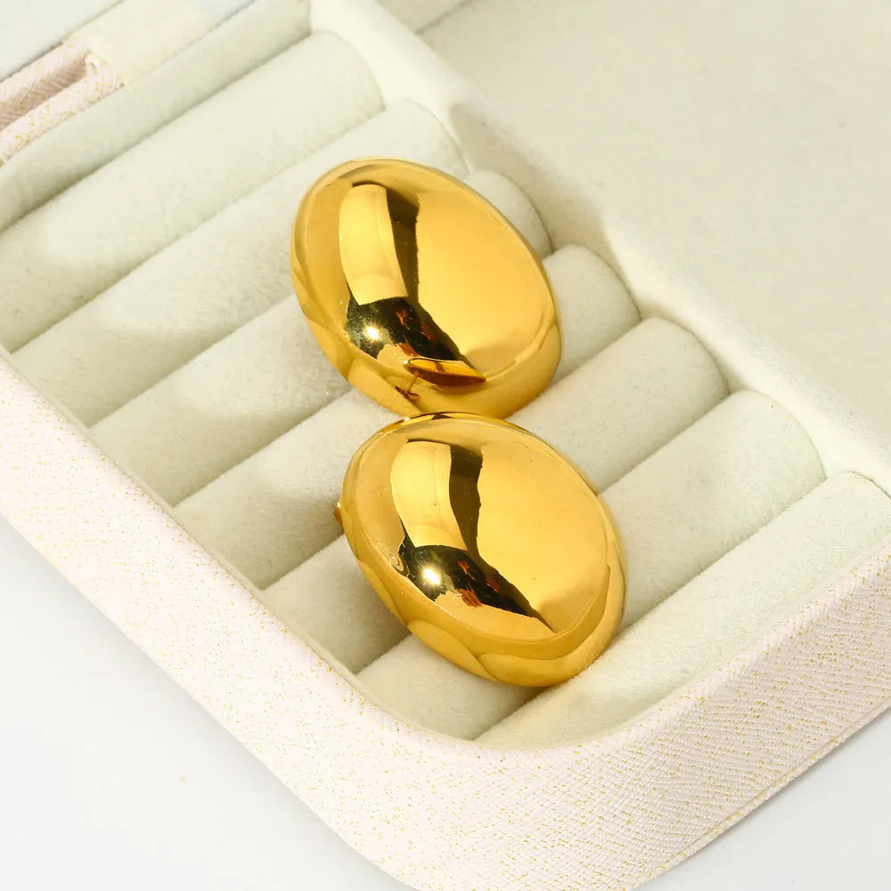 Geometric stainless steel ear studs with electroplated 18K gold finish and glazed surface in colour DFE139