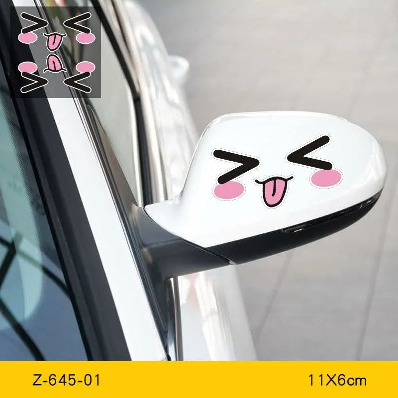 Pair of reflective cartoon car stickers with cute eye designs on a white background.