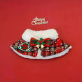 Red background pet Christmas cloak with bell design, shown on a dog, with adjustable scarf length.