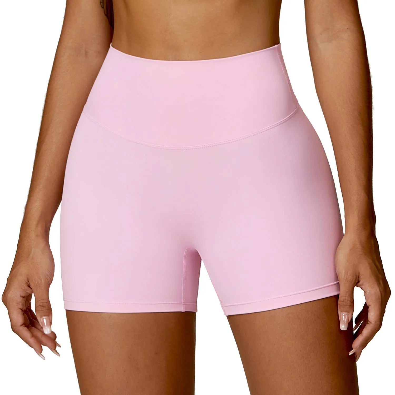 Women's high waist yoga shorts in nylon with belly control panel and peach hip lift design.