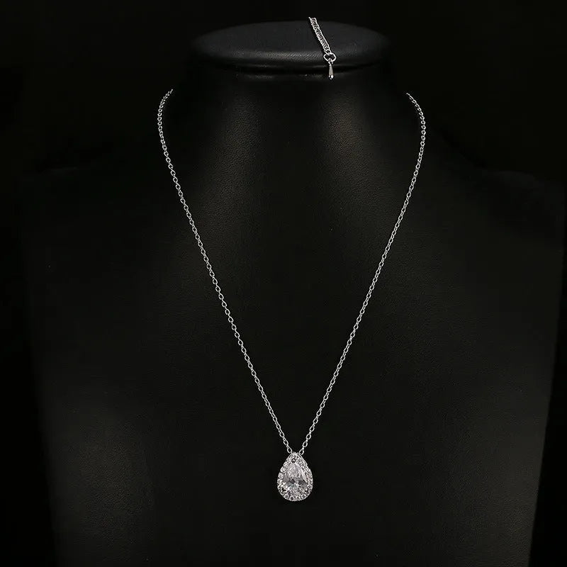 Women's water drop gemstone necklace and earrings jewellery set in copper and zircon, available in gold finish