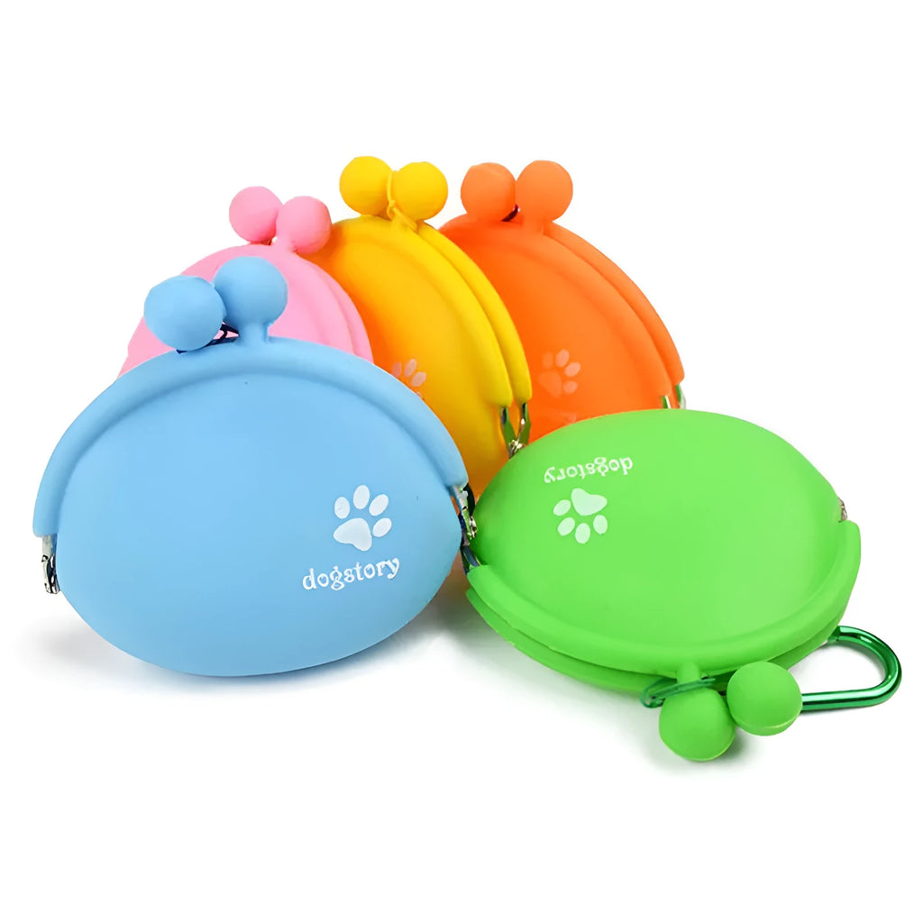 Yellow silicone dog training treat pouch with hook-and-loop closure, shown clipped to a waistband.