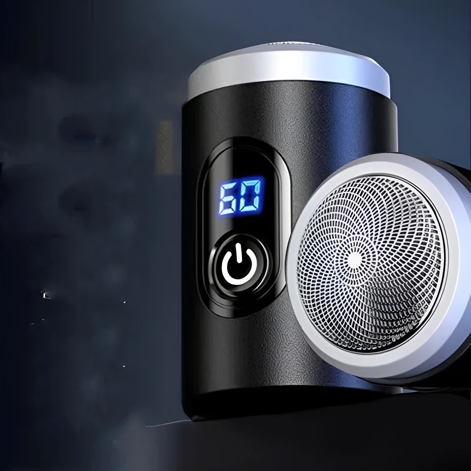Black household mini portable rechargeable shaver with USB cable and cleaning brush on a white background.