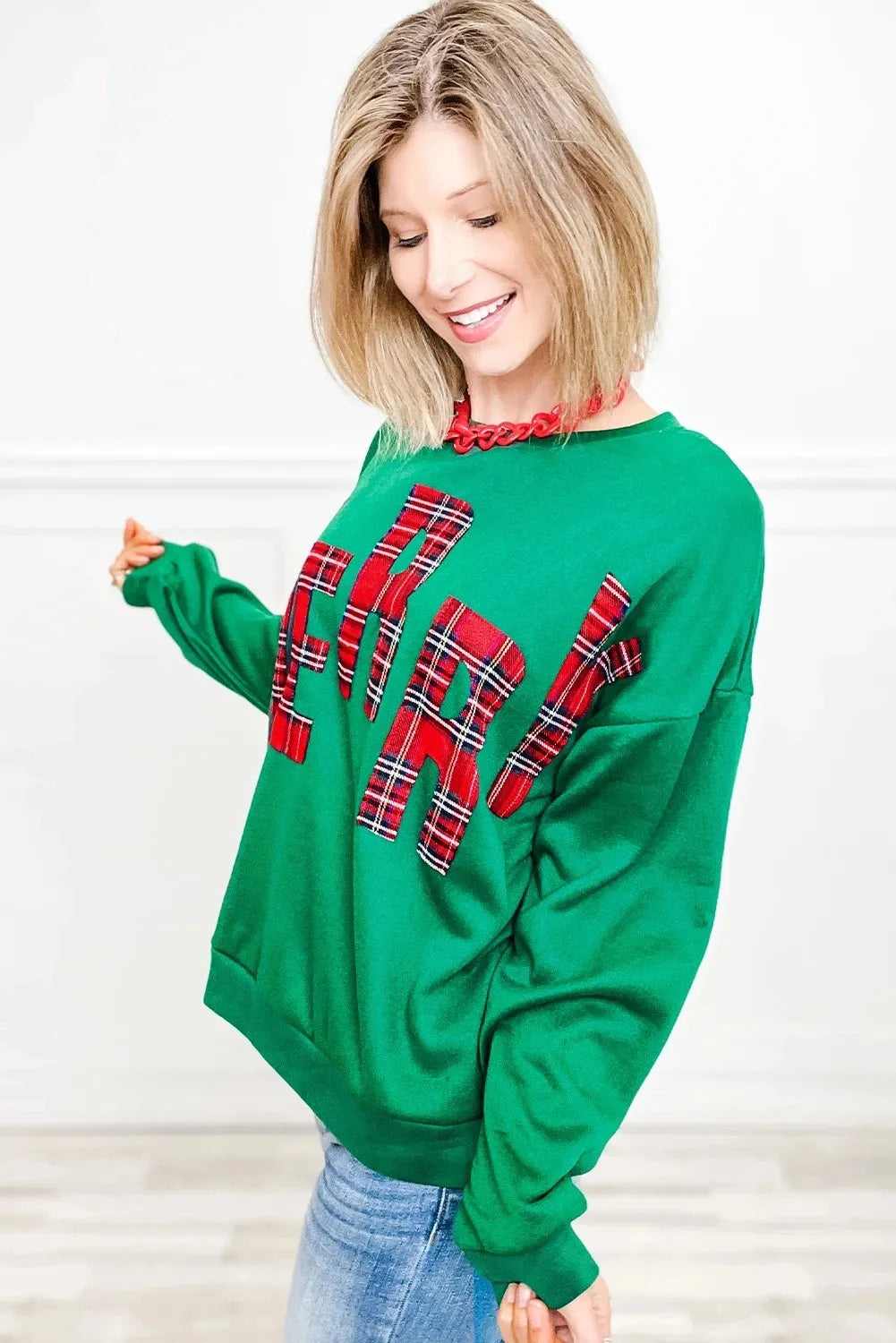 Women's casual embroidered side plaid pullover sweater in white, loose fit long sleeves