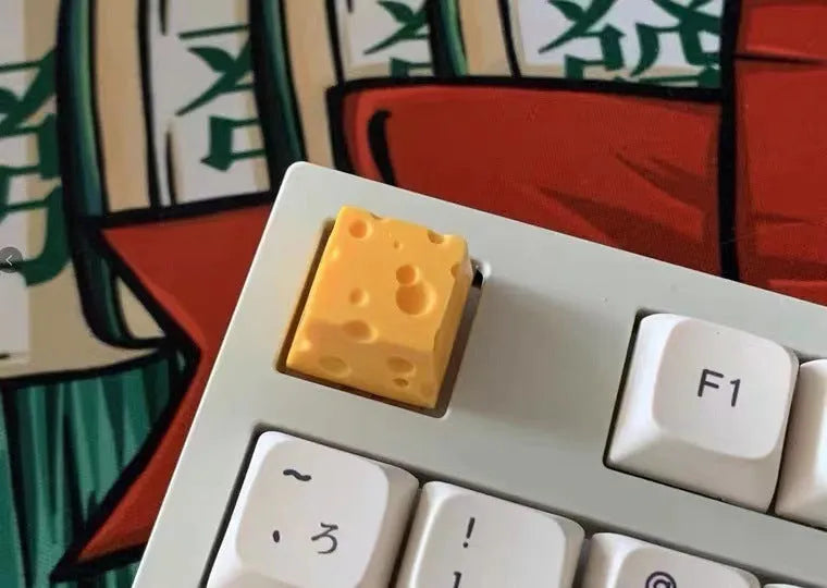 Yellow solid resin custom mechanical keyboard keycap with detailed cheese design