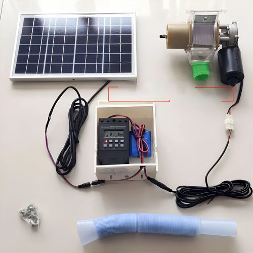 Solar panel automatic chicken and duck feeding machine with timer display and watertight casing.