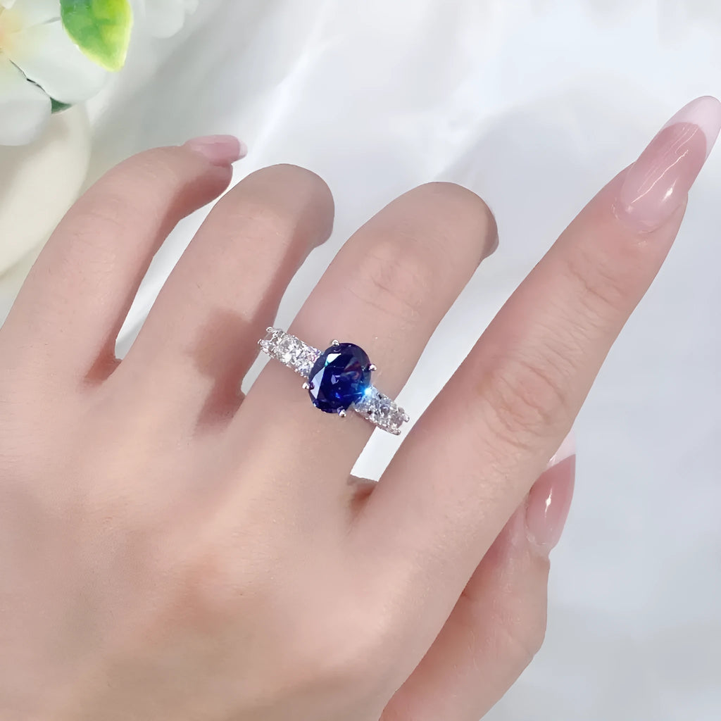 Heart-shaped sterling silver ring with a clear, faceted tan sang zircon stone.
