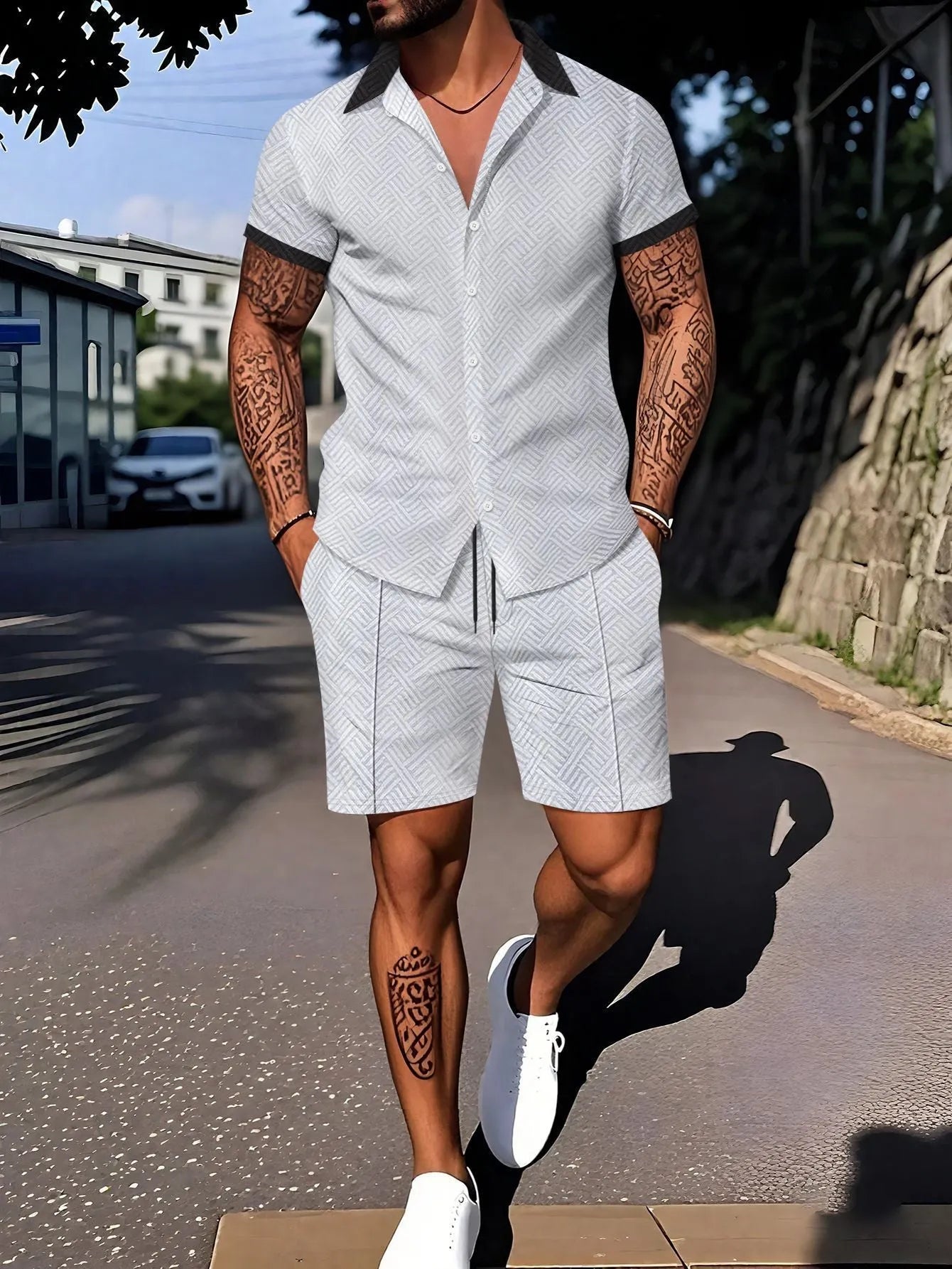 Man wearing a digitally printed short sleeve casual suit set in a neutral colour.