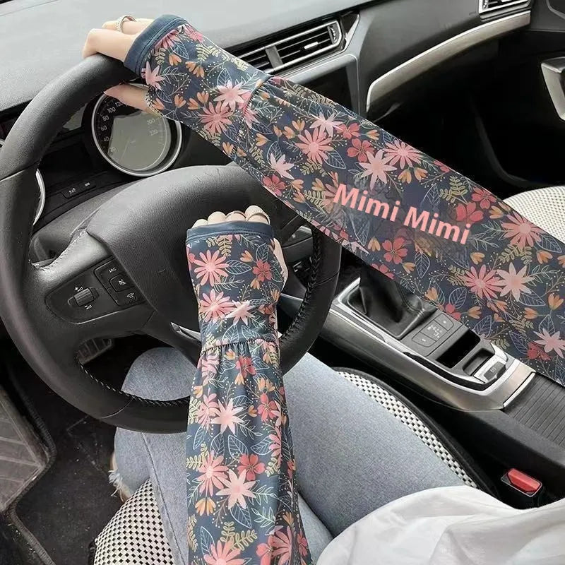 Printed floral pattern sun protection oversleeves for arms and elbows in ice silk fabric.